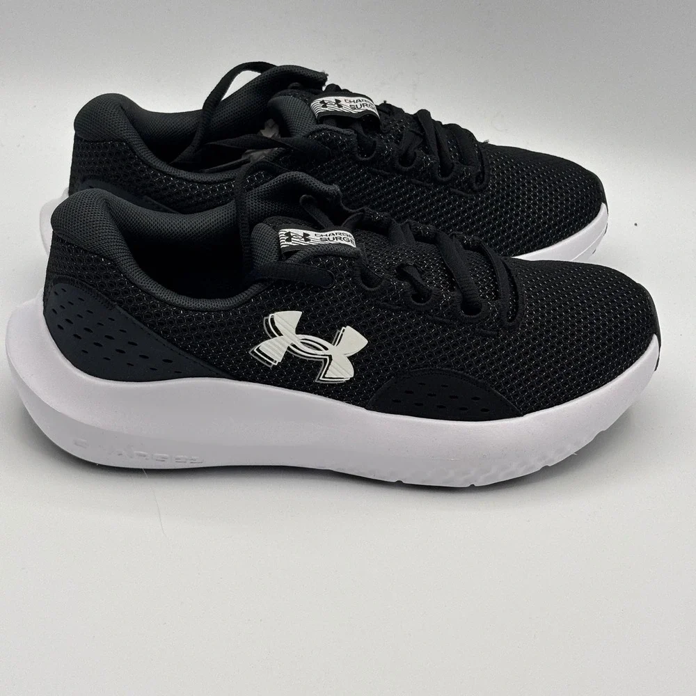Under Armour UA Charged Surge 4 Shoes Womens Size 6.5 Black White 3027007-001